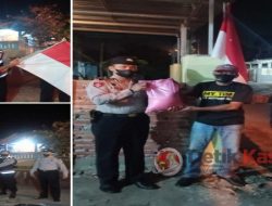 Polsek Tarik Gelar Kegiatan Pembagian Bansos dan Bendera Merah Putih