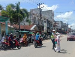 Personel Unit Turjagwali Satlantas Polres Aceh Tamiang Rutin Laksanakan Gatur Pada Zona Aman Sekolah