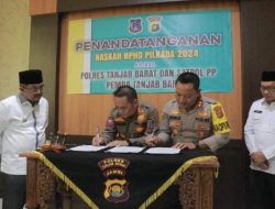 Bupati Saksikan Penandatanganan NPHD antara Polres dan Sat Pol-PP Tanjabbar