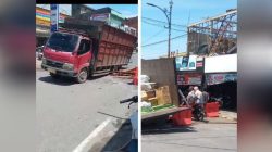 Sebuah mobil terpuruk ditengah jalan dalam kota Tungkal,Diduga Akibat Jalan Berlubang Tanpa Di Pasang  Rambu